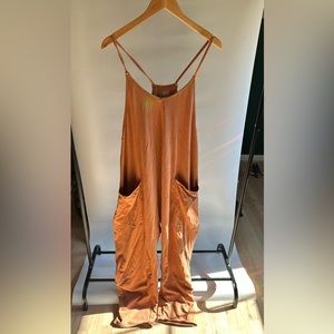 LIKE NEW FP MOVEMENT HOT SHOT ONESIE SIZE MEDIUM IN TOASTED COCONUT